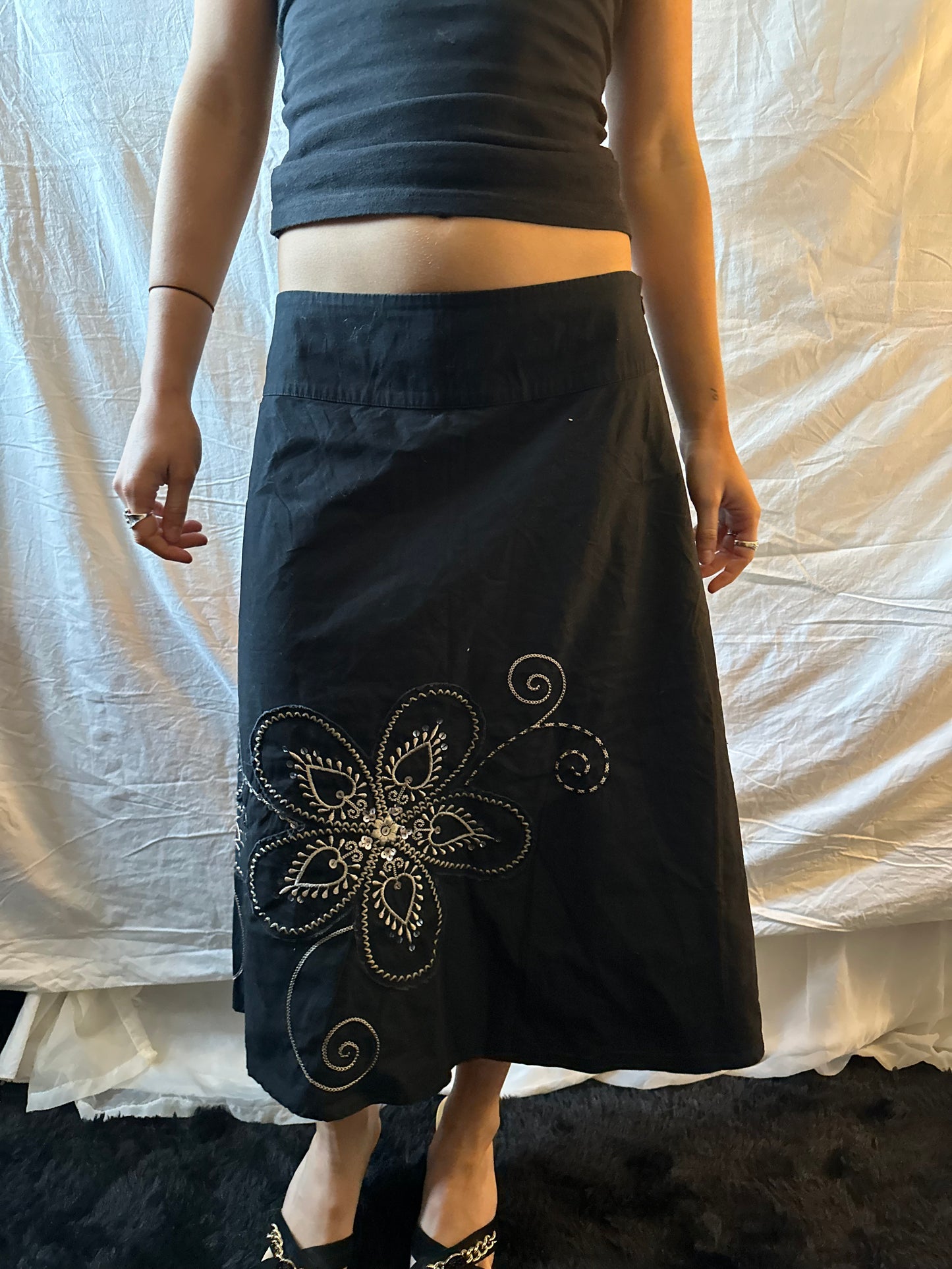 Black flower patterned midi skirt