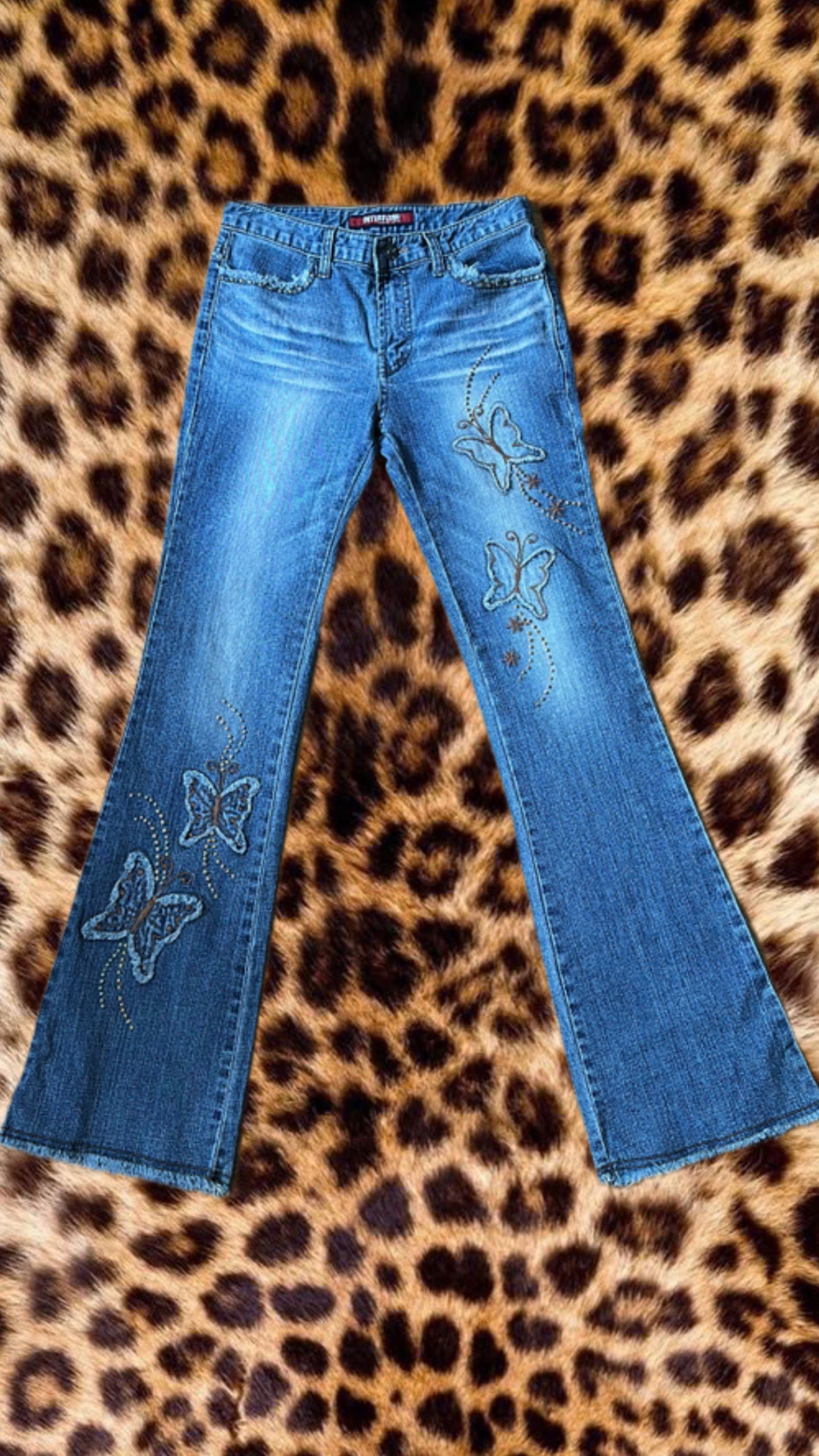 Light blue butterfly jeans