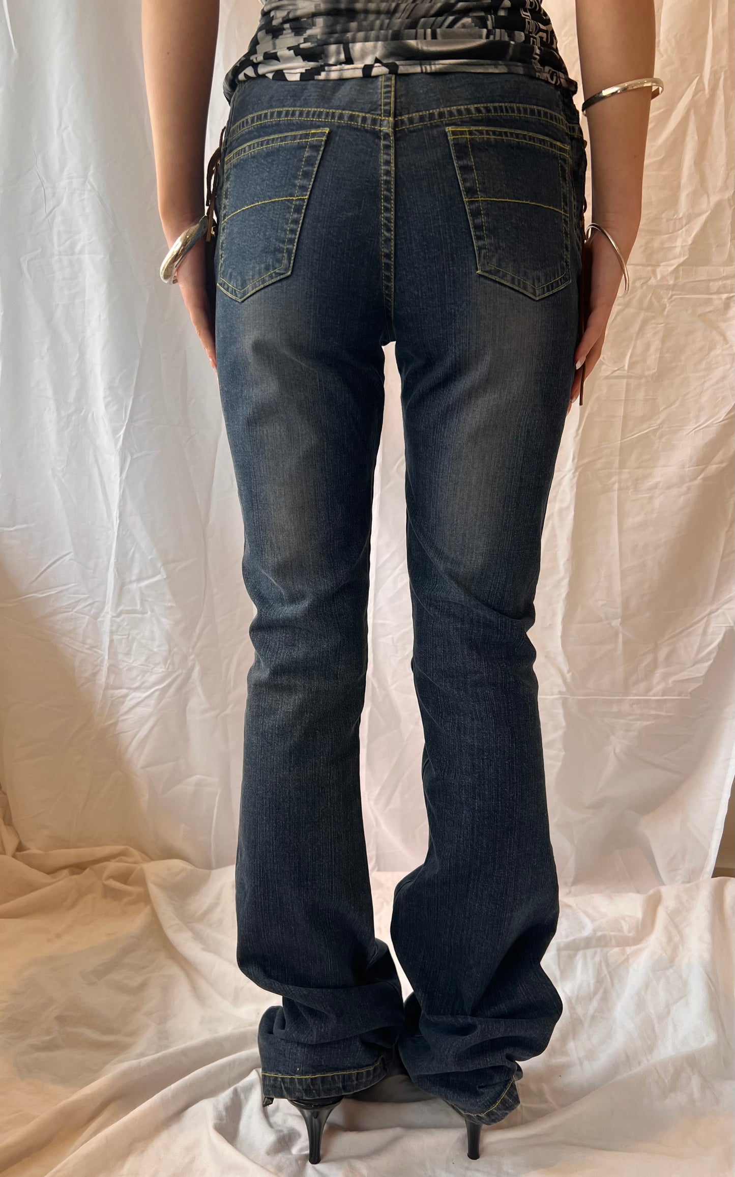 Funky jeans with yellow stripes