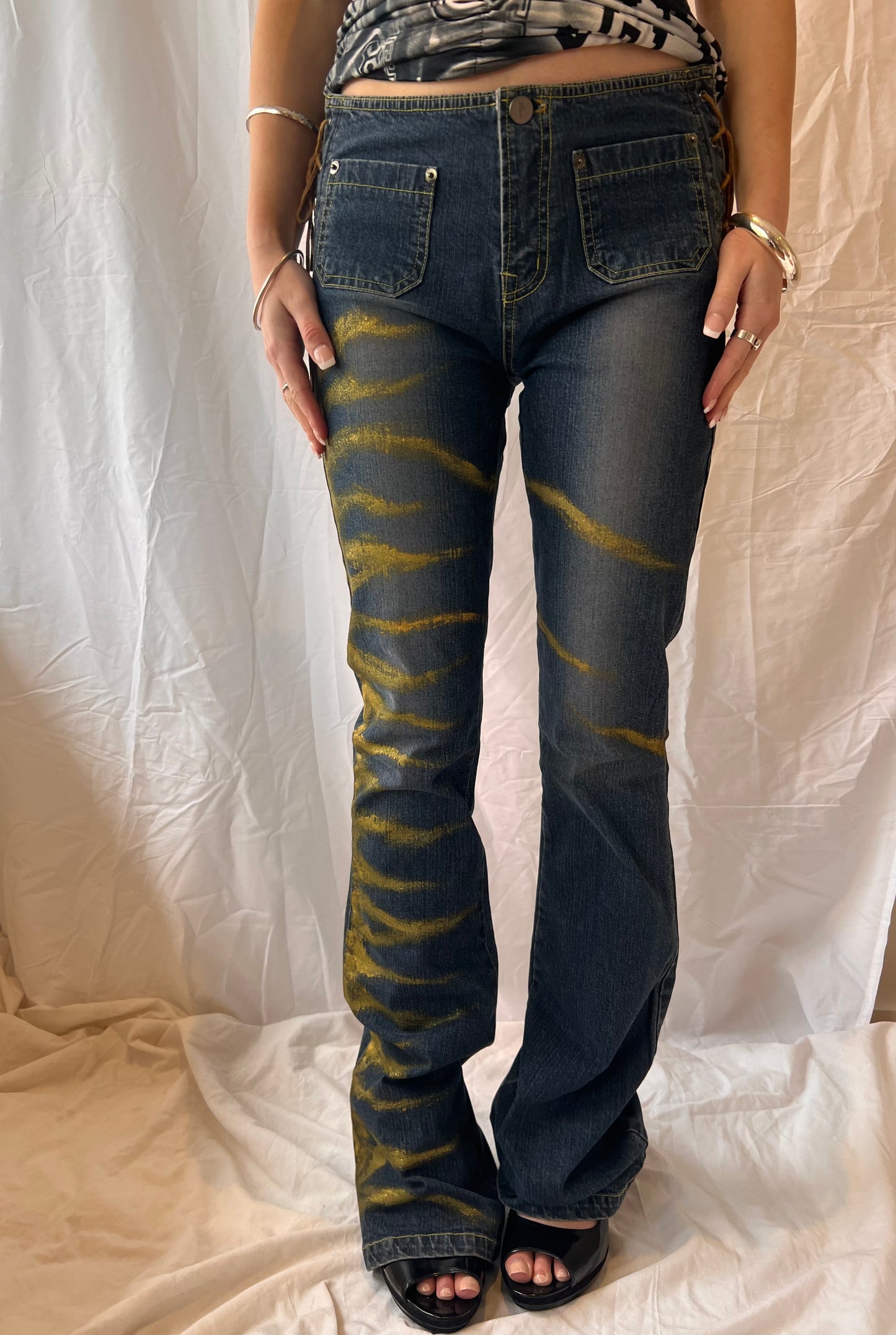 Funky jeans with yellow stripes