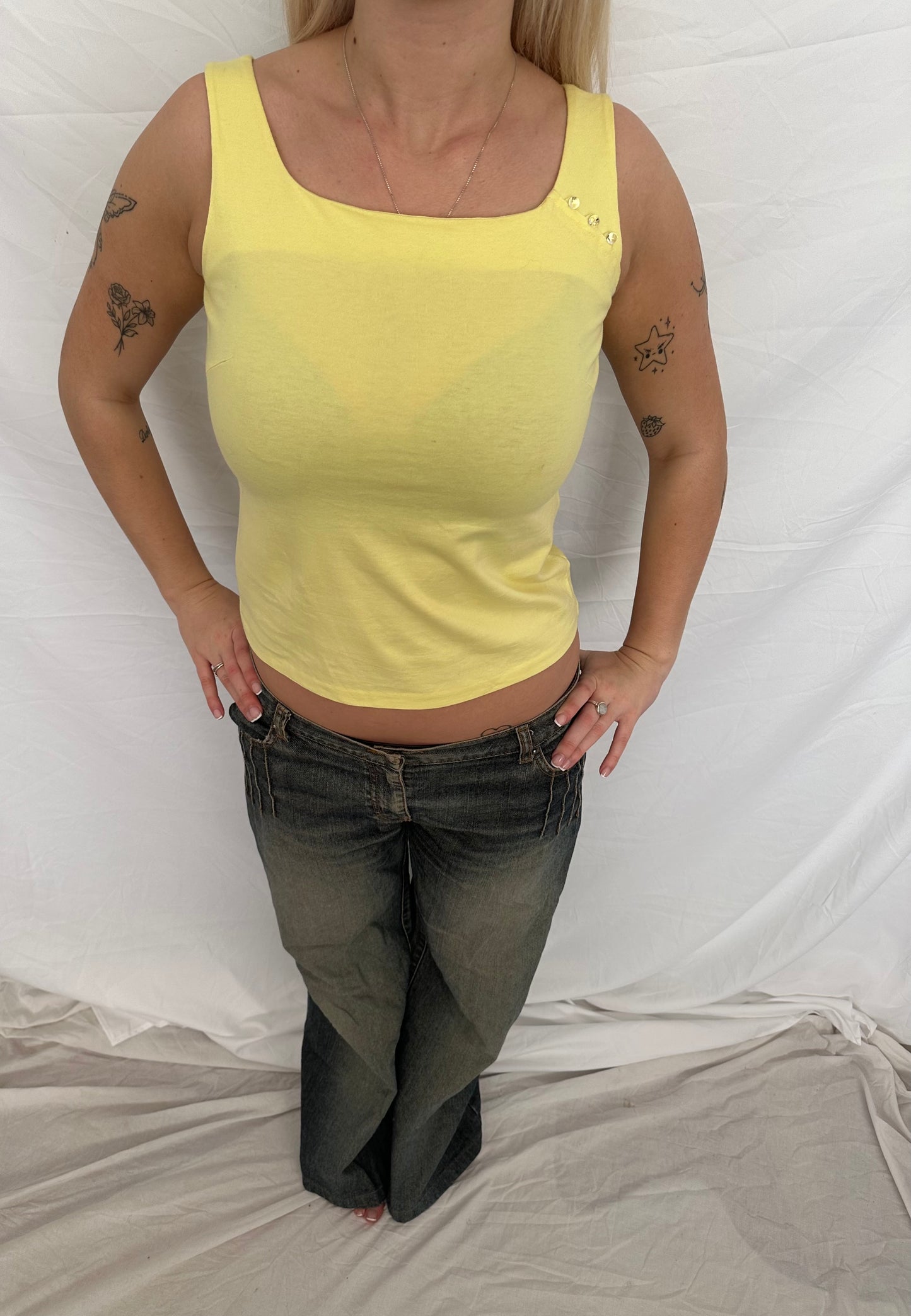 Yellow singlet with button detail