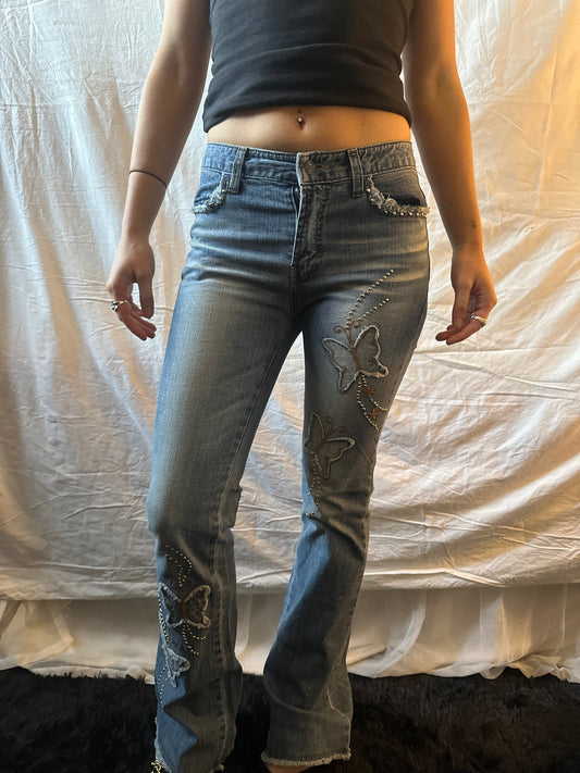 Light blue butterfly jeans